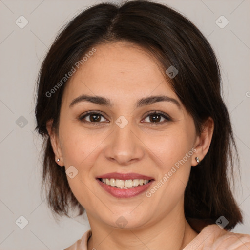 Joyful white young-adult female with medium  brown hair and brown eyes