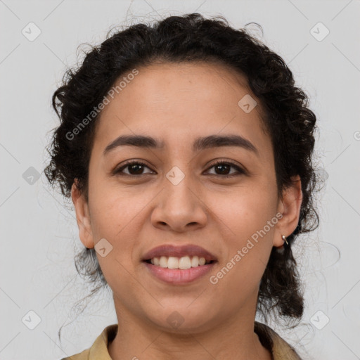 Joyful latino young-adult female with medium  brown hair and brown eyes