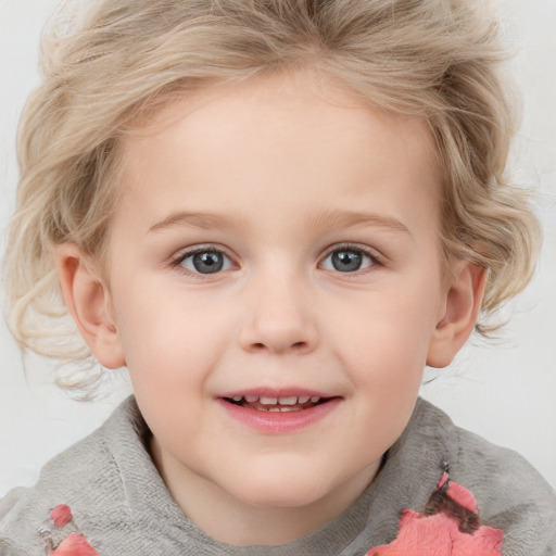 Joyful white child female with medium  blond hair and blue eyes