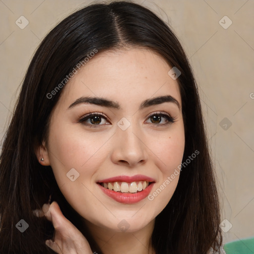 Joyful white young-adult female with long  brown hair and brown eyes