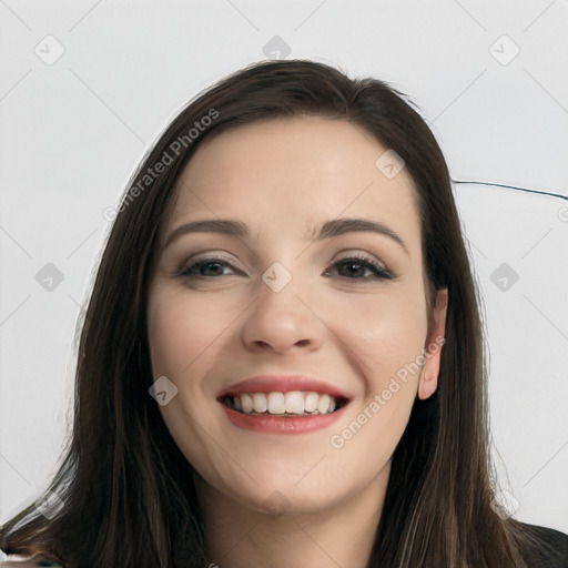 Joyful white young-adult female with long  black hair and brown eyes