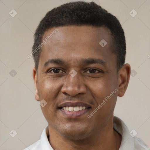Joyful latino adult male with short  black hair and brown eyes