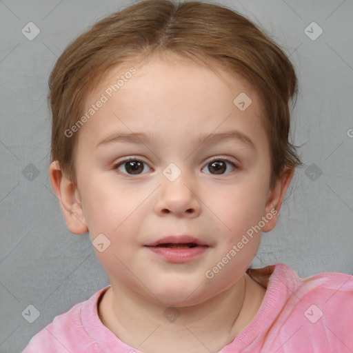 Joyful white child female with short  brown hair and brown eyes