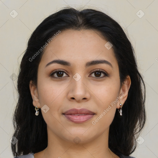 Joyful latino young-adult female with long  brown hair and brown eyes