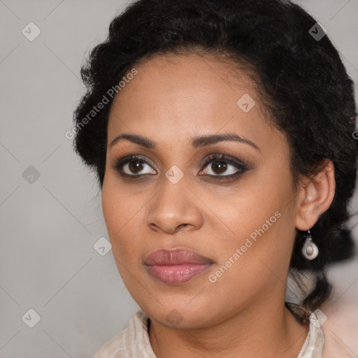 Joyful latino young-adult female with long  brown hair and brown eyes