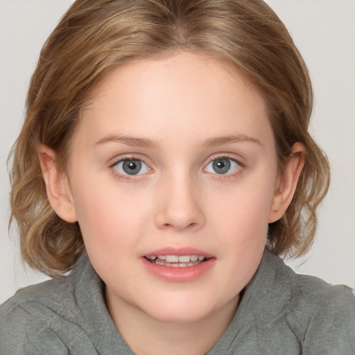 Joyful white child female with medium  brown hair and brown eyes