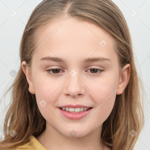 Joyful white child female with long  brown hair and brown eyes