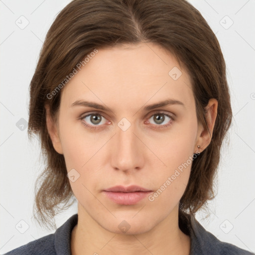 Neutral white young-adult female with medium  brown hair and grey eyes