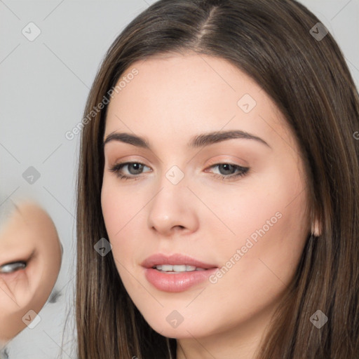 Neutral white young-adult female with long  brown hair and brown eyes