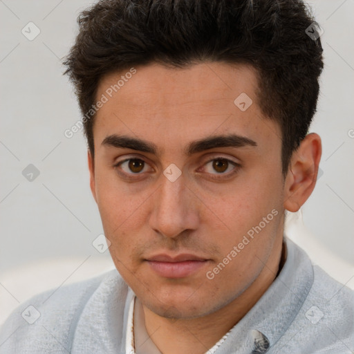 Neutral white young-adult male with short  brown hair and brown eyes