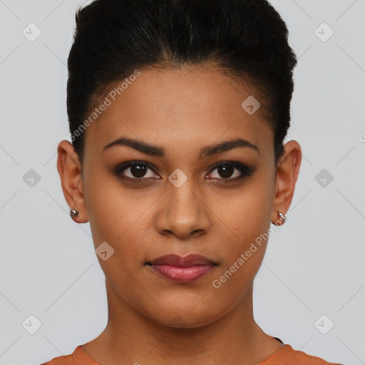 Joyful latino young-adult female with short  brown hair and brown eyes