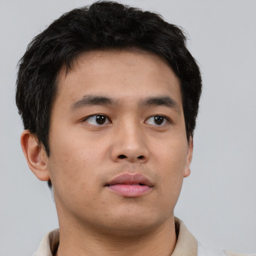 Neutral asian young-adult male with short  brown hair and brown eyes