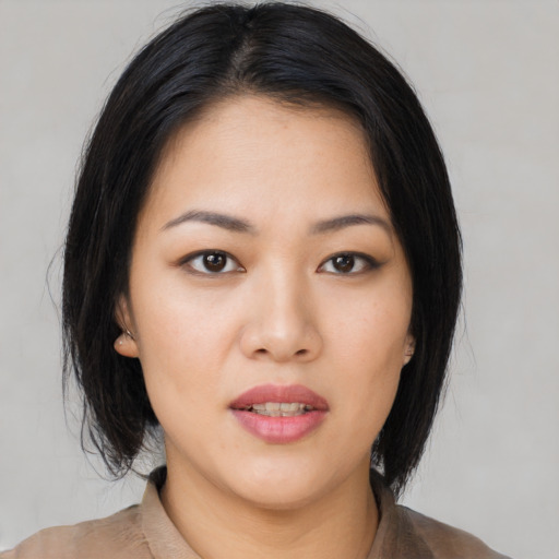 Neutral asian young-adult female with medium  black hair and brown eyes