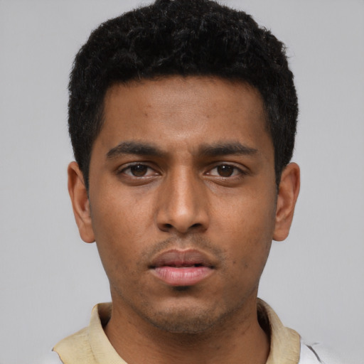 Neutral black young-adult male with short  black hair and brown eyes
