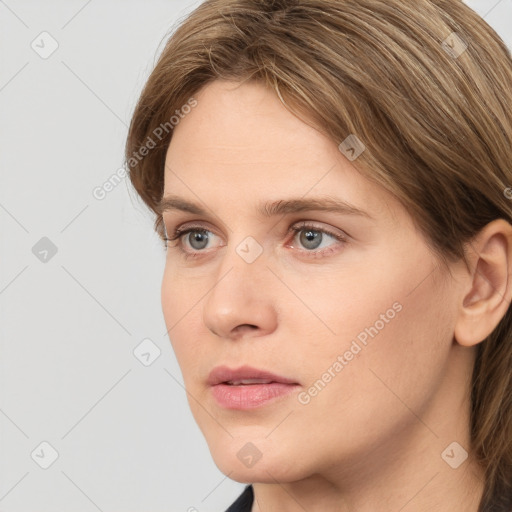 Neutral white young-adult female with medium  brown hair and brown eyes