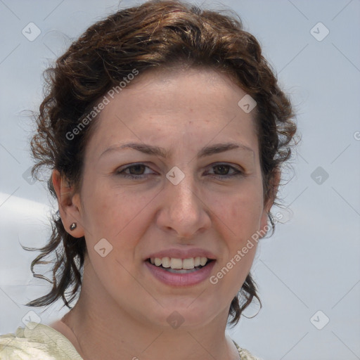 Joyful white young-adult female with medium  brown hair and blue eyes