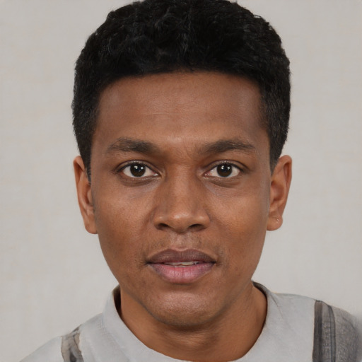 Neutral black young-adult male with short  black hair and brown eyes
