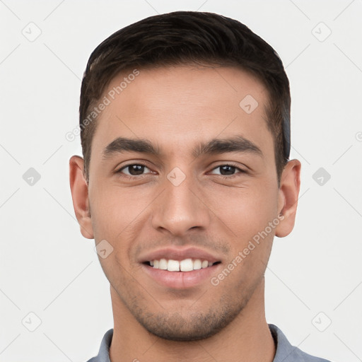 Joyful white young-adult male with short  brown hair and brown eyes