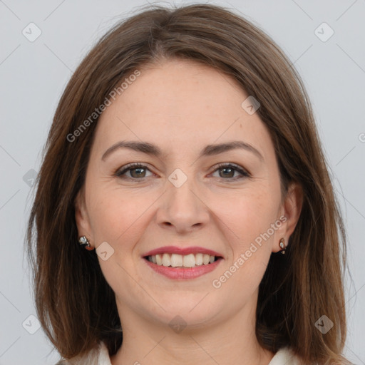 Joyful white young-adult female with long  brown hair and grey eyes