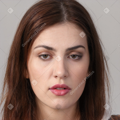 Neutral white young-adult female with long  brown hair and brown eyes