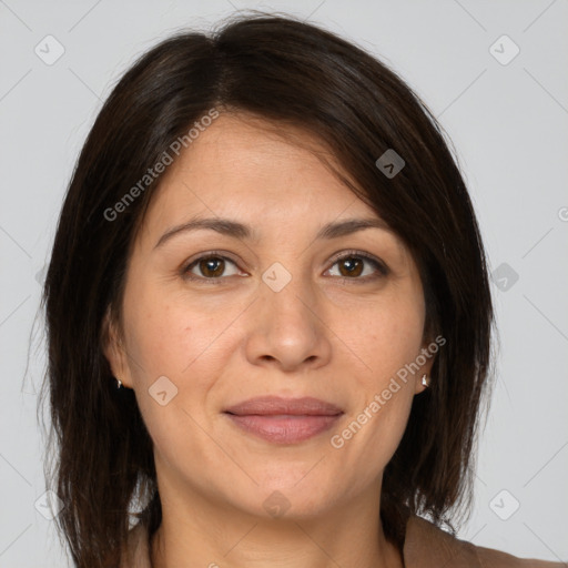 Joyful white adult female with medium  brown hair and brown eyes