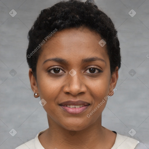 Joyful black young-adult female with short  black hair and brown eyes