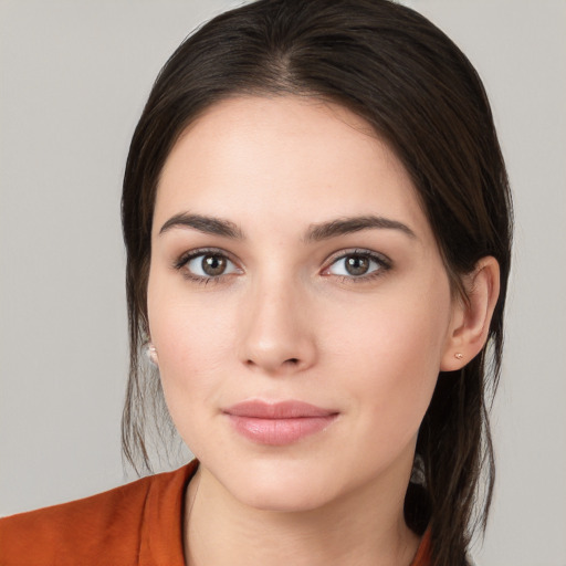 Neutral white young-adult female with medium  brown hair and brown eyes