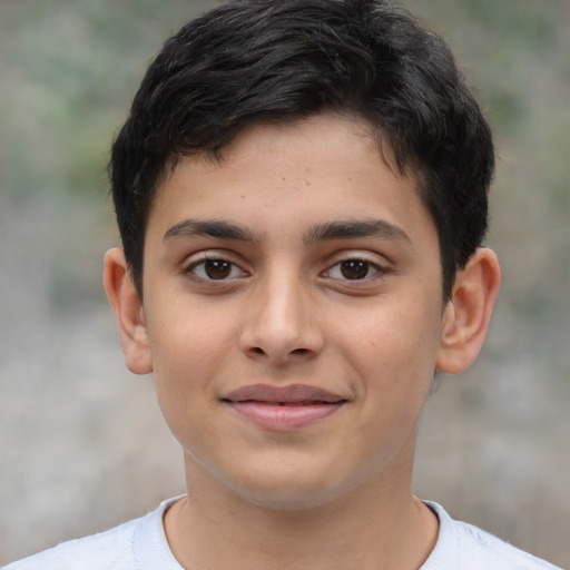 Joyful latino young-adult male with short  brown hair and brown eyes