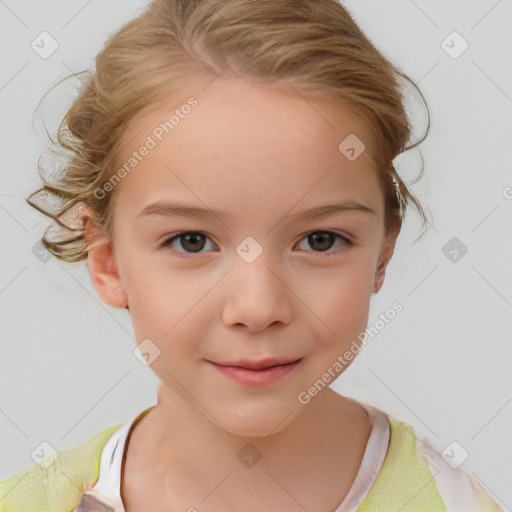 Joyful white child female with short  brown hair and brown eyes