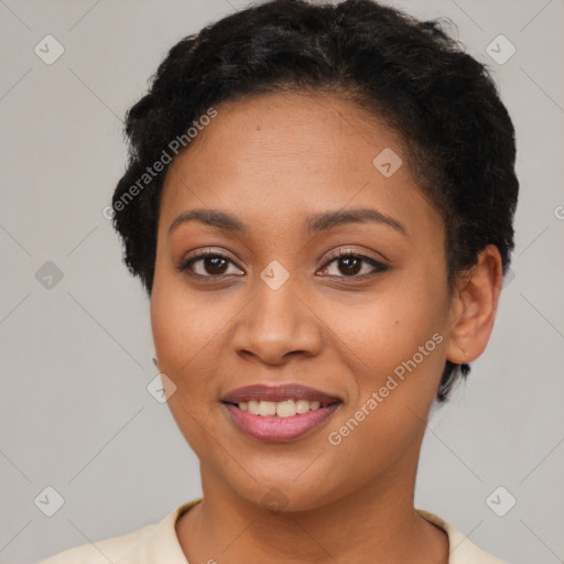 Joyful latino young-adult female with short  brown hair and brown eyes