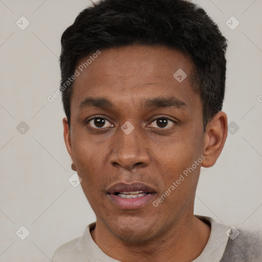 Neutral black adult male with short  black hair and brown eyes