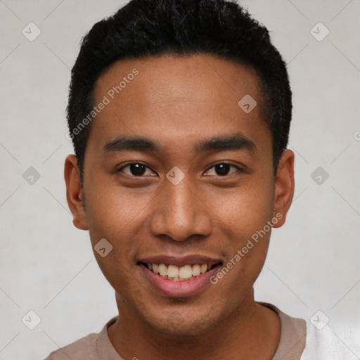 Joyful latino young-adult male with short  black hair and brown eyes