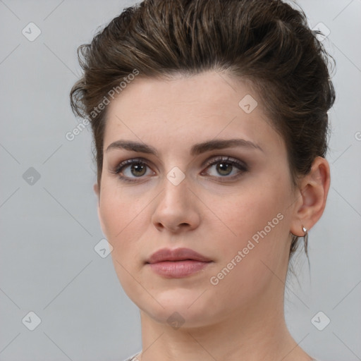 Neutral white young-adult female with short  brown hair and brown eyes