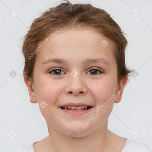 Joyful white child female with short  brown hair and brown eyes