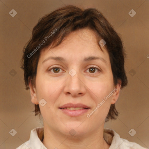 Joyful white adult female with short  brown hair and brown eyes