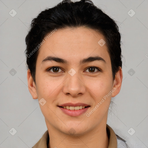 Joyful latino young-adult female with short  brown hair and brown eyes