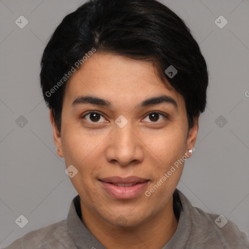 Joyful latino young-adult male with short  black hair and brown eyes