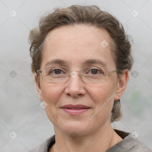 Joyful white adult female with short  brown hair and grey eyes