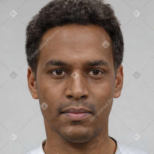 Neutral latino young-adult male with short  brown hair and brown eyes