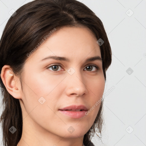 Neutral white young-adult female with medium  brown hair and brown eyes