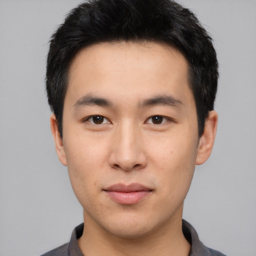 Neutral asian young-adult male with short  black hair and brown eyes