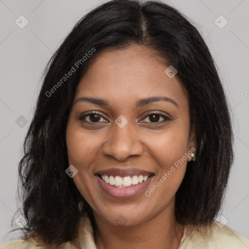 Joyful black young-adult female with medium  brown hair and brown eyes