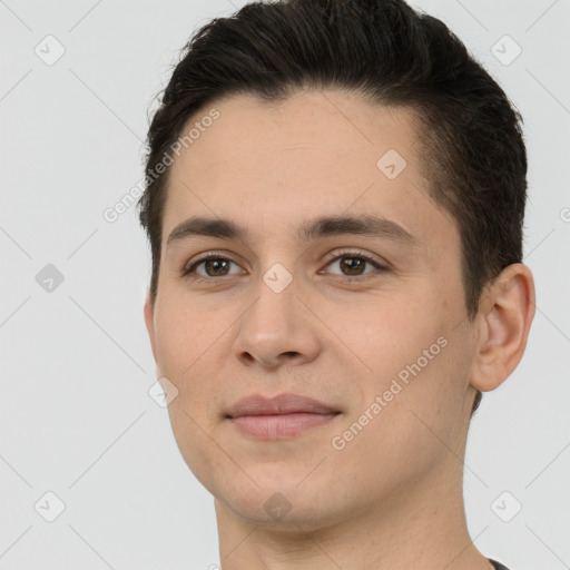 Joyful white young-adult male with short  brown hair and brown eyes