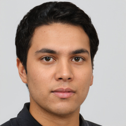 Neutral white young-adult male with short  black hair and brown eyes