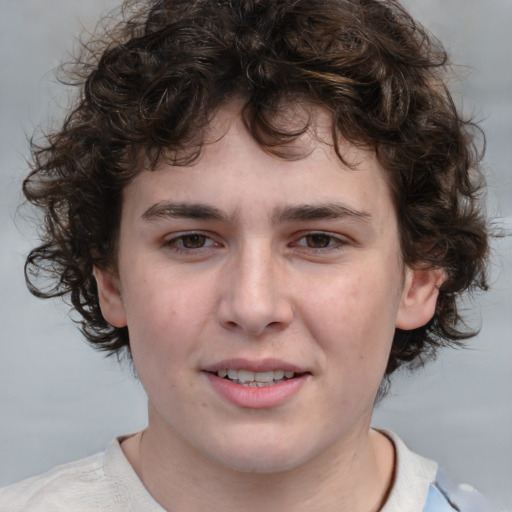 Joyful white young-adult male with medium  brown hair and brown eyes