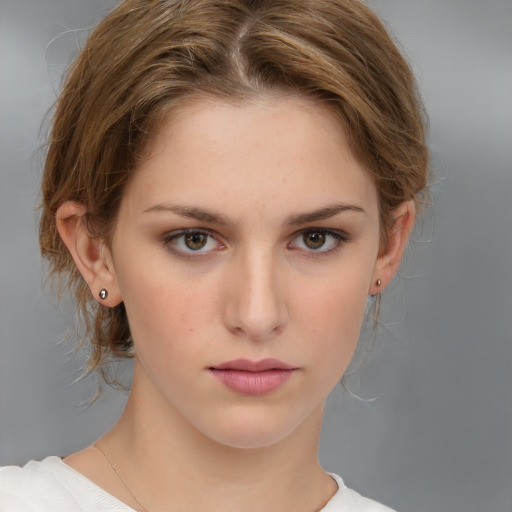 Neutral white young-adult female with medium  brown hair and brown eyes