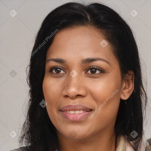 Joyful latino young-adult female with medium  brown hair and brown eyes