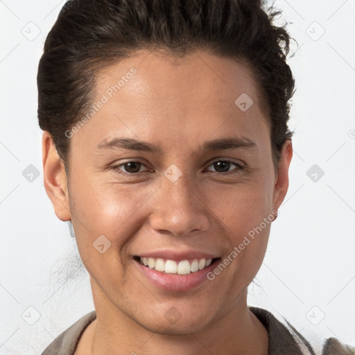 Joyful white young-adult female with short  brown hair and brown eyes