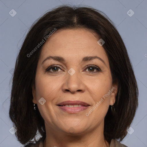 Joyful white adult female with medium  brown hair and brown eyes