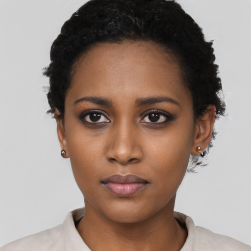 Neutral black young-adult female with short  black hair and brown eyes
